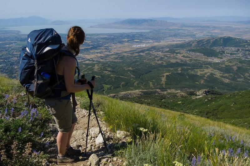 Carly enjoying the view and taking a breather on our approach to Lone Peak.