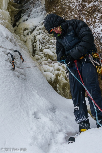 Chris gearing up to lead some steep ice.