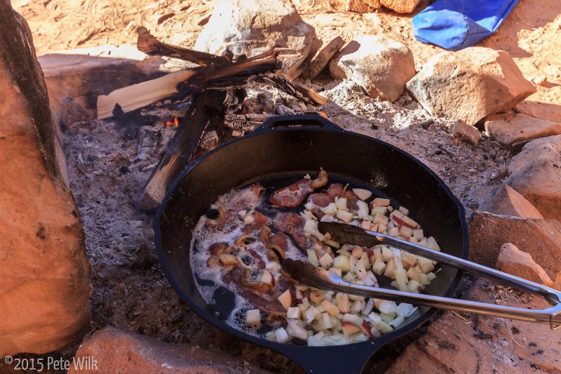 Cooking breakfast like the coyboys did.  A NO match fire as there were still some coals from the previous night.