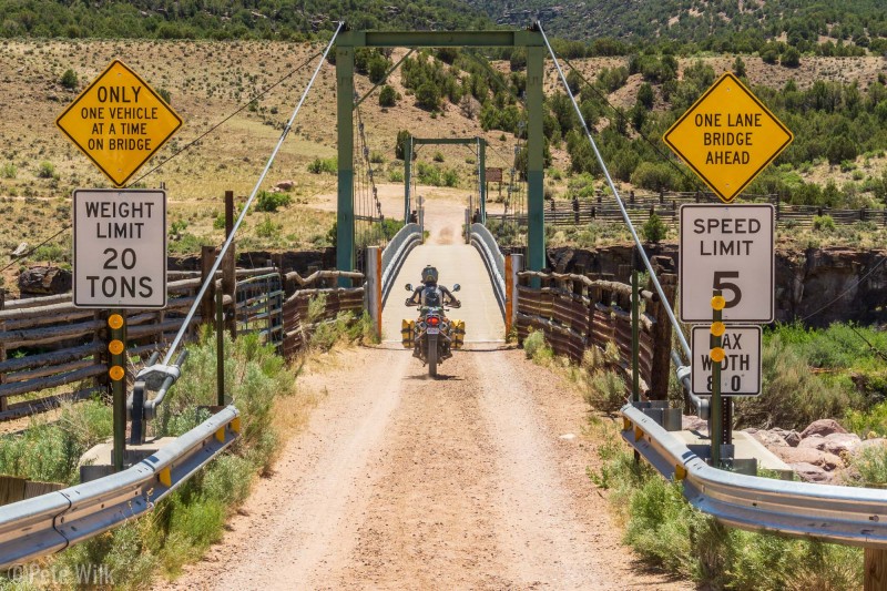 Andreas riding over the narrow Swinging Bridge.  I can't imagine too many high clearance vehicles narrow enough to get over the bridge to the road on the other side.