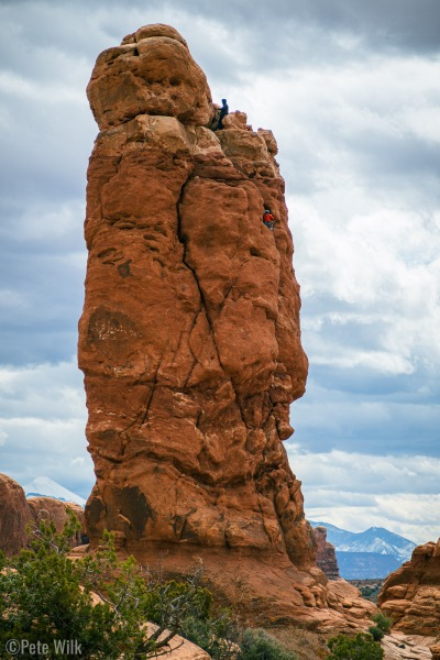 View from the parking lot of Owl Rock.  Climbers seen finishing up the main pitch.